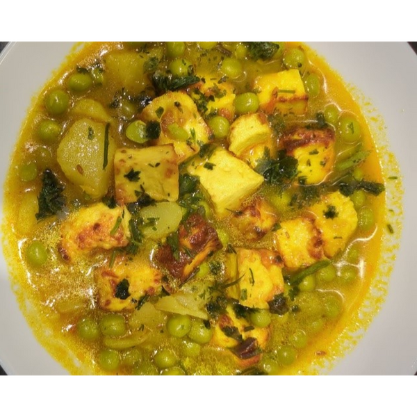 Foto los curry met doperwtjes